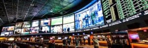 Large display of television screens in a sports betting center